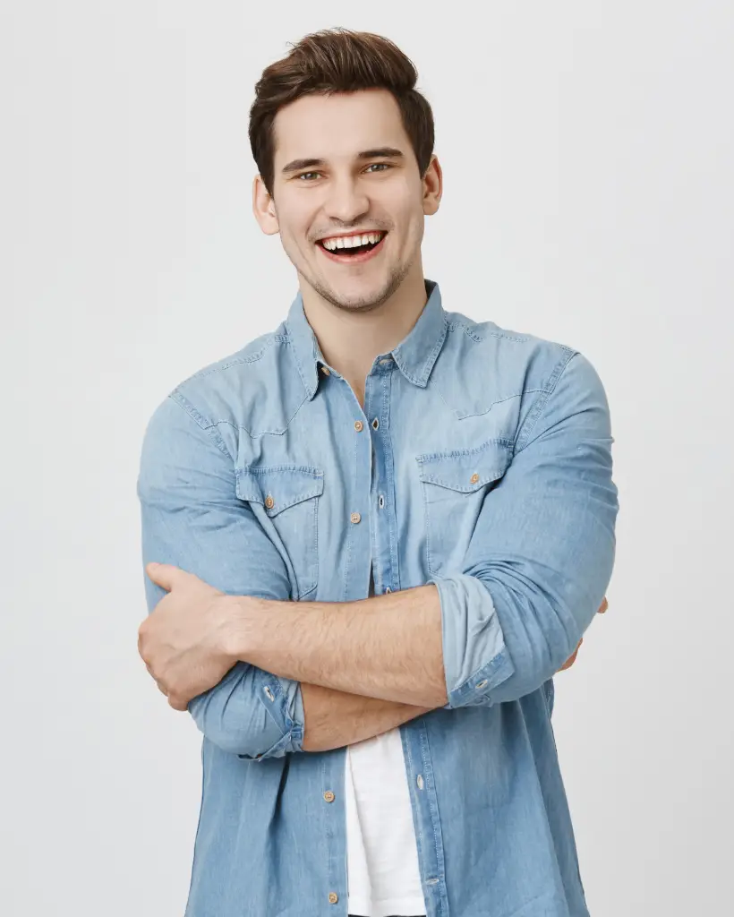 portrait-of-guy-wearing-denim-shirt-standing-with-VVHQ92C.jpg
